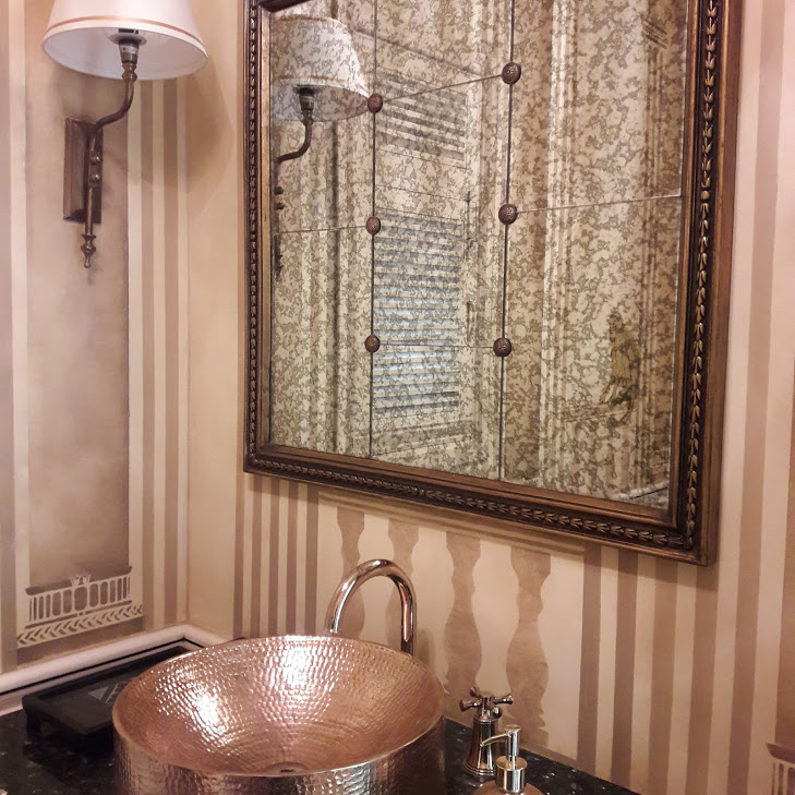 Bathroom with striped wallpaper